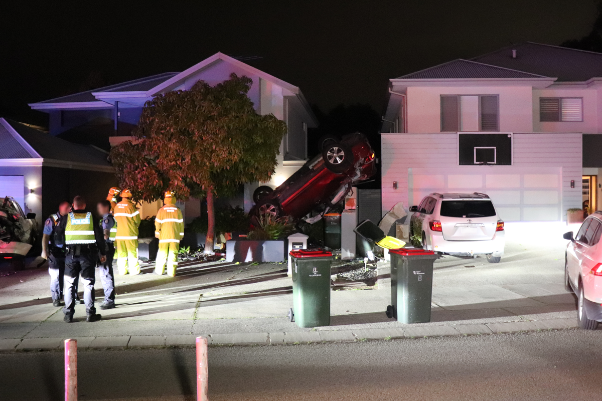 Article image for Dramatic northern suburbs car chase ends in crashed car upside down