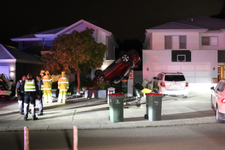 Dramatic northern suburbs car chase ends in crashed car upside down