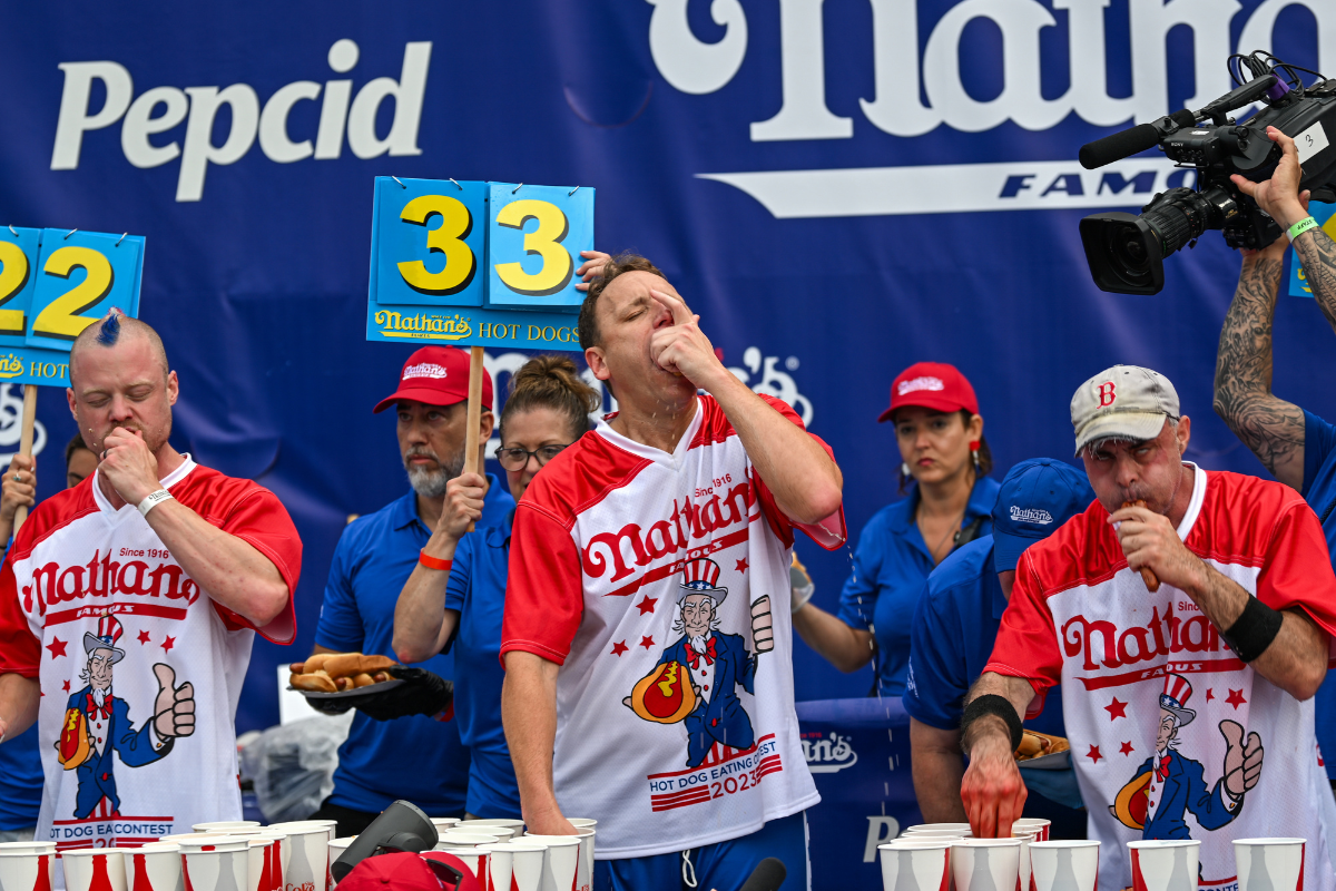 Article image for Aussie downs the dogs, earns shock placing in famed eating contest