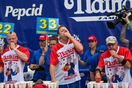 Aussie downs the dogs, earns shock placing in famed eating contest