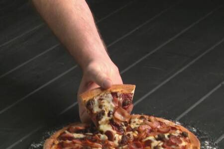 Queensland teacher lands $100 an hour hand model job with Domino’s Pizza