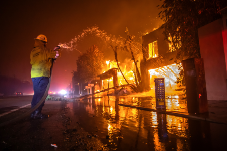 Strong winds threaten to fan the fires in LA